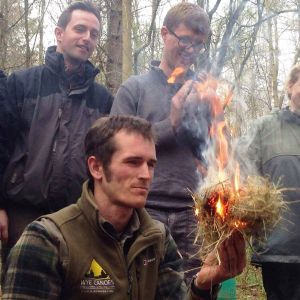 Ollie using an ember to start a fire