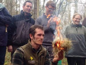 Ollie using an ember to start a fire