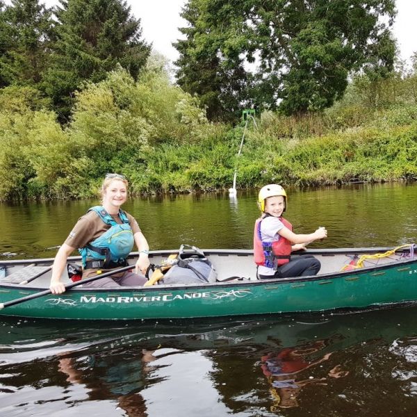 Canoe Guide with young paddler.