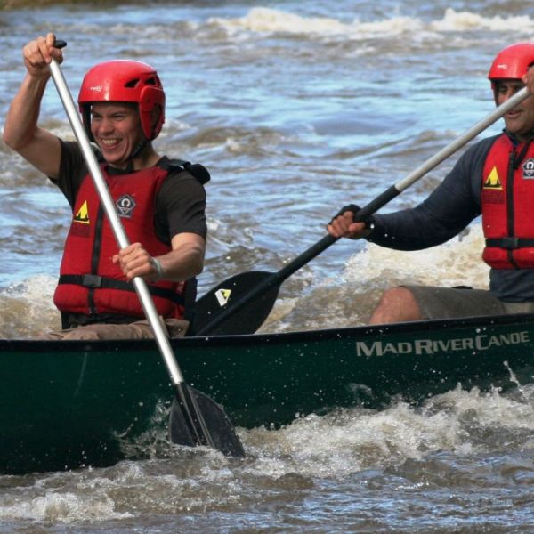 Canoeing Symonds Yat Rapids.